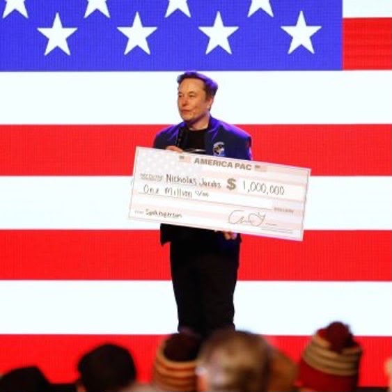 America PAC promotional event with a ceremonial check